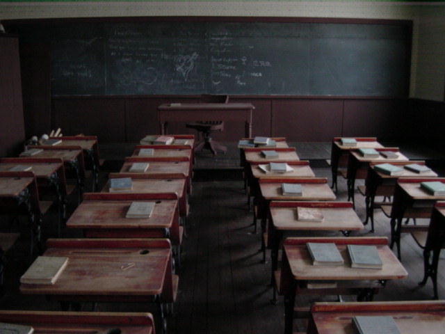 Rows of desks in the schoolhouse